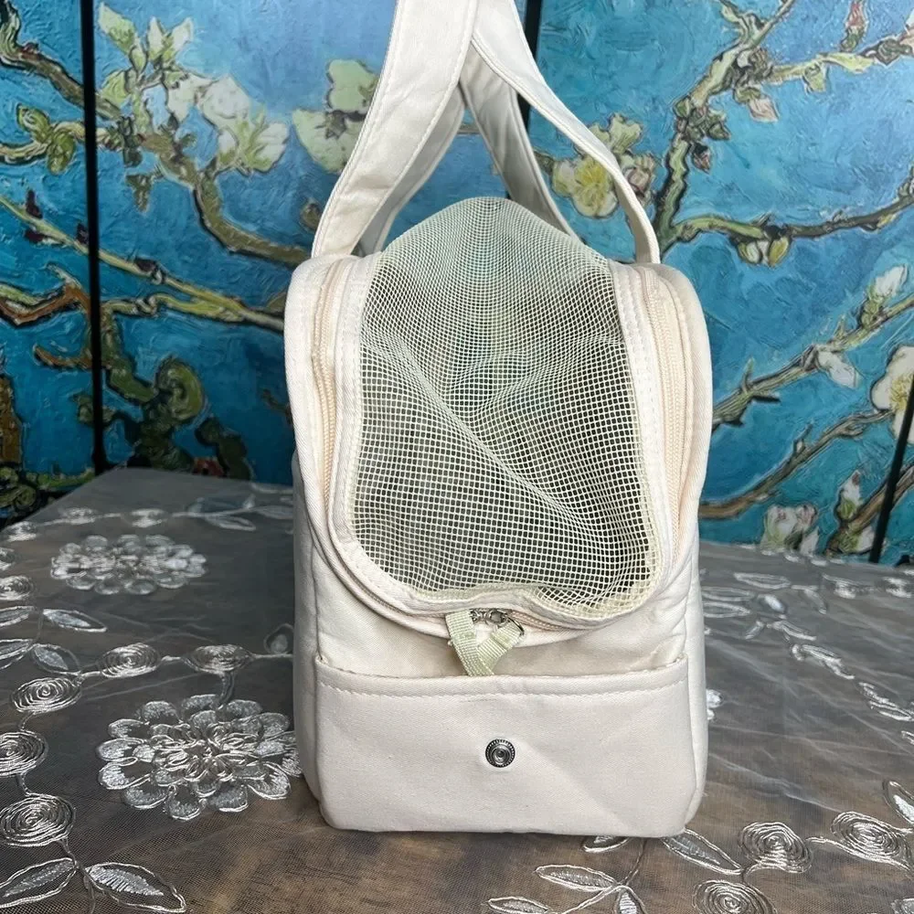 Cute gender neutral Small pet carrier by Fluffy Baby. Cream removable cushion.